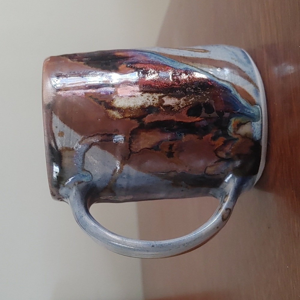 Artistic Ceramic Mug with Earthy Tones